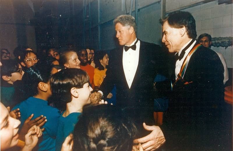 Jacques d’Amboise with kids getting ready to go on stage