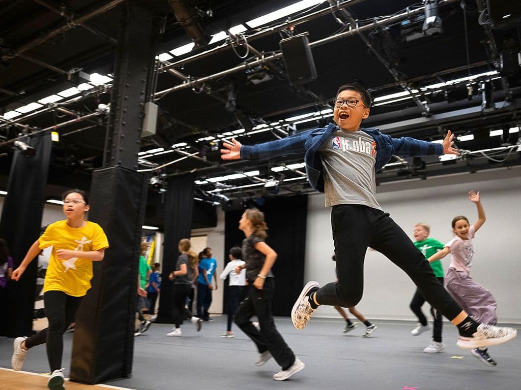 Children Jumping Photo by C. Duggan