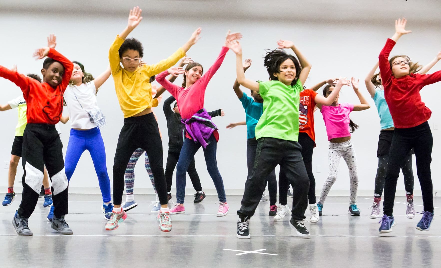 Kid waving arms and jumping