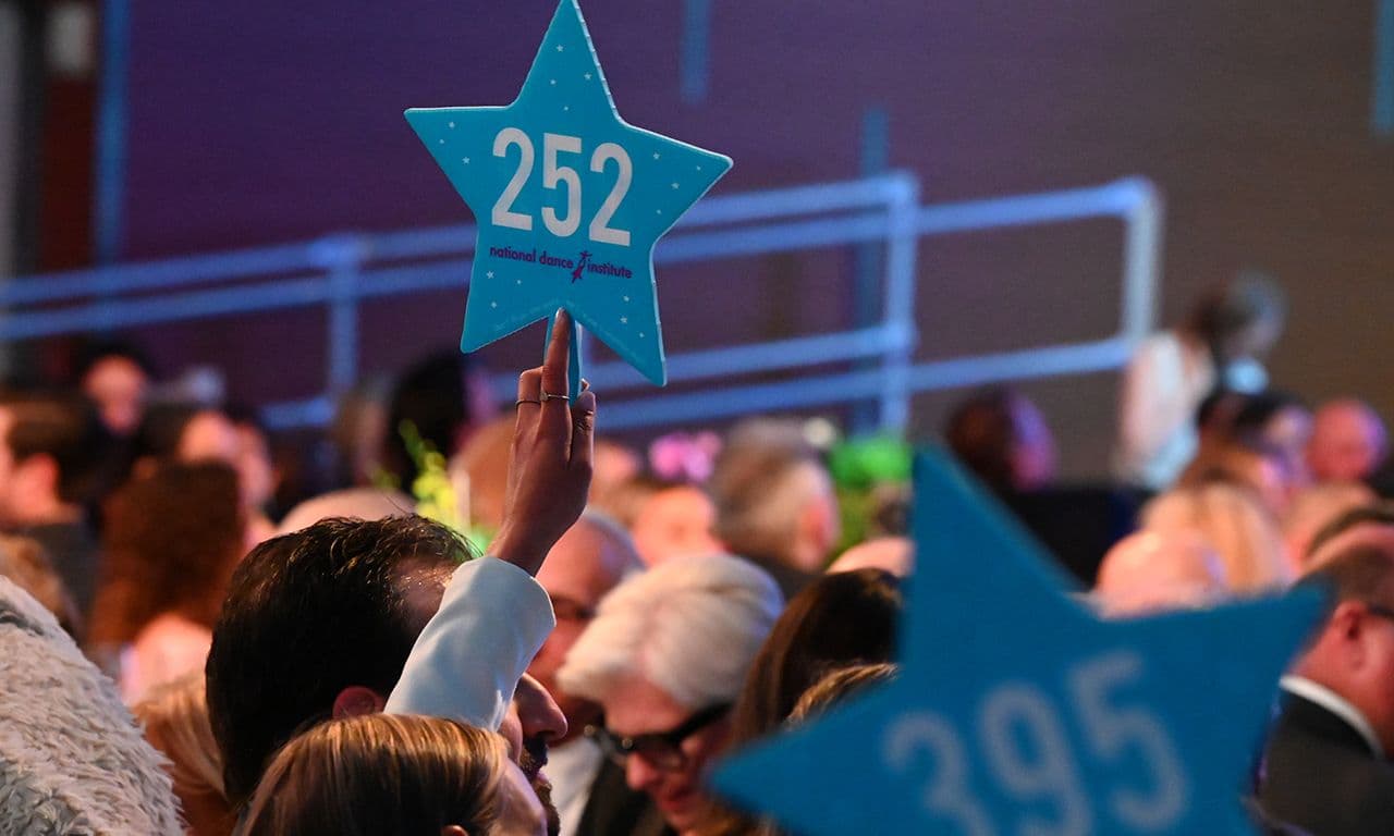 Gala paddles during auction