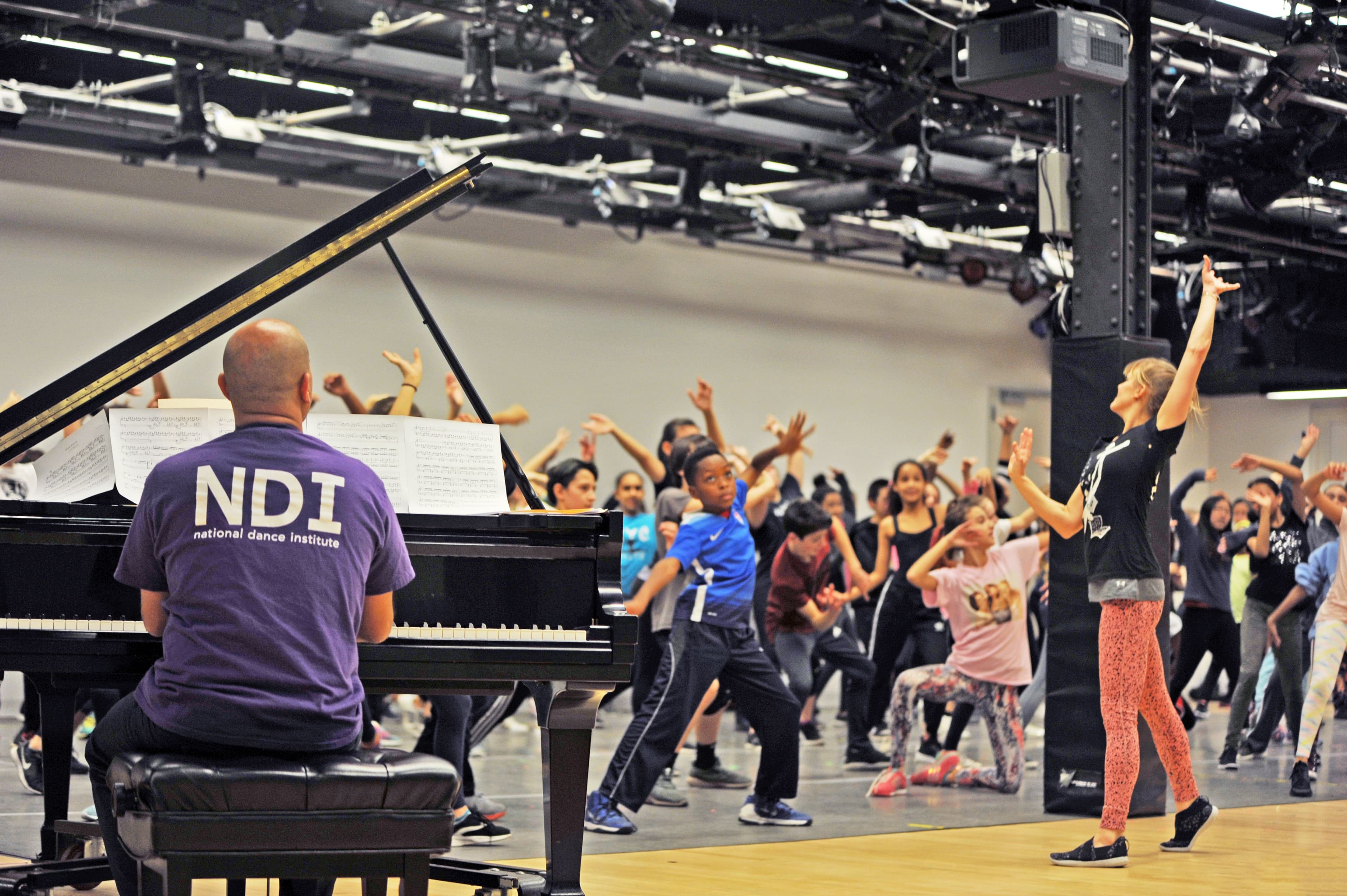 Teacher with Musician and Students
