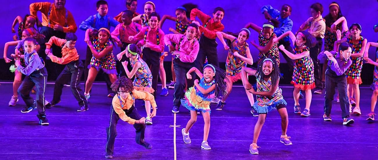Children from Advanced Teams Perform on Stage